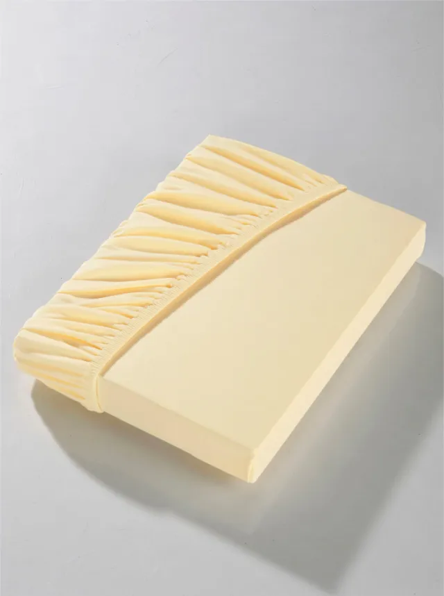 Hoeslaken vanillegeel