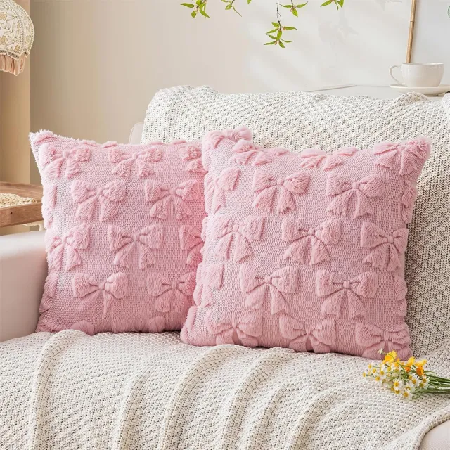 Famanu Set van 2 roze pluche kussenhoezen 45x45 cm, decoratief en zacht, ideaal voor banken en slaapkamers, met romantische strikdecoratie en pluisvrije, kleurvaste stof voor langdurig gebruik
