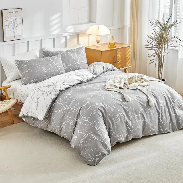 Unyqoos Complete vierdelige beddengoedset in grijs en wit voor optimaal slaapcomfort